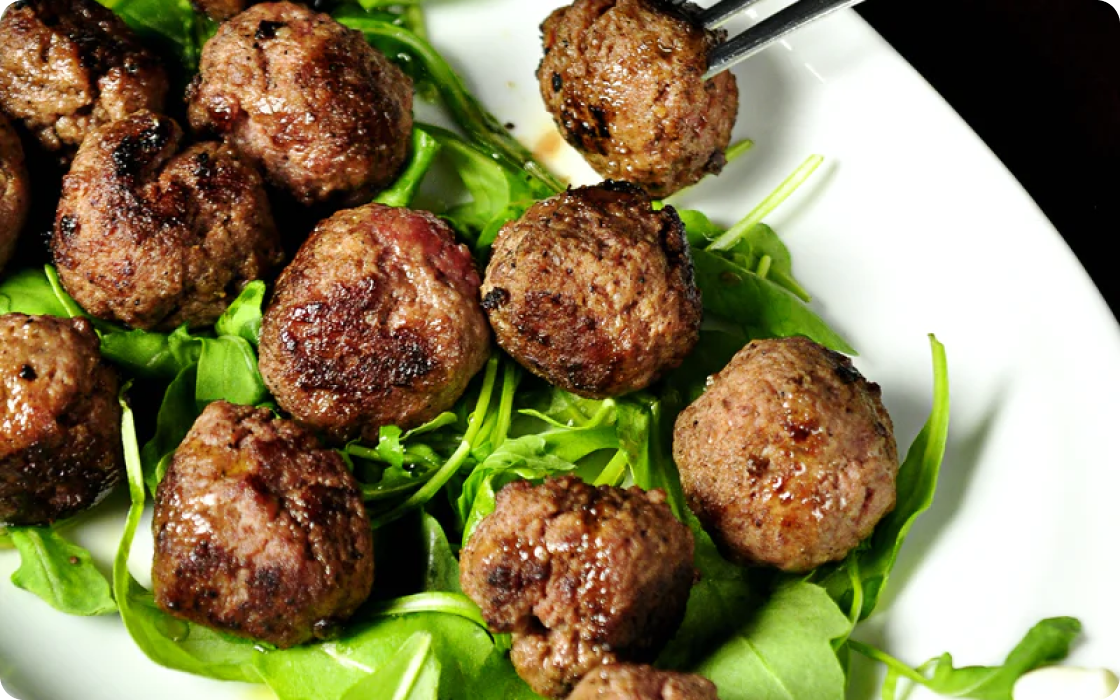 a plate with meatballs